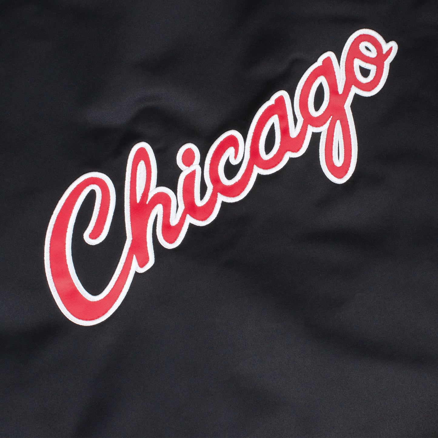 Chicago Bulls Mitchell & Ness Satin Bomber Jacket - close up view