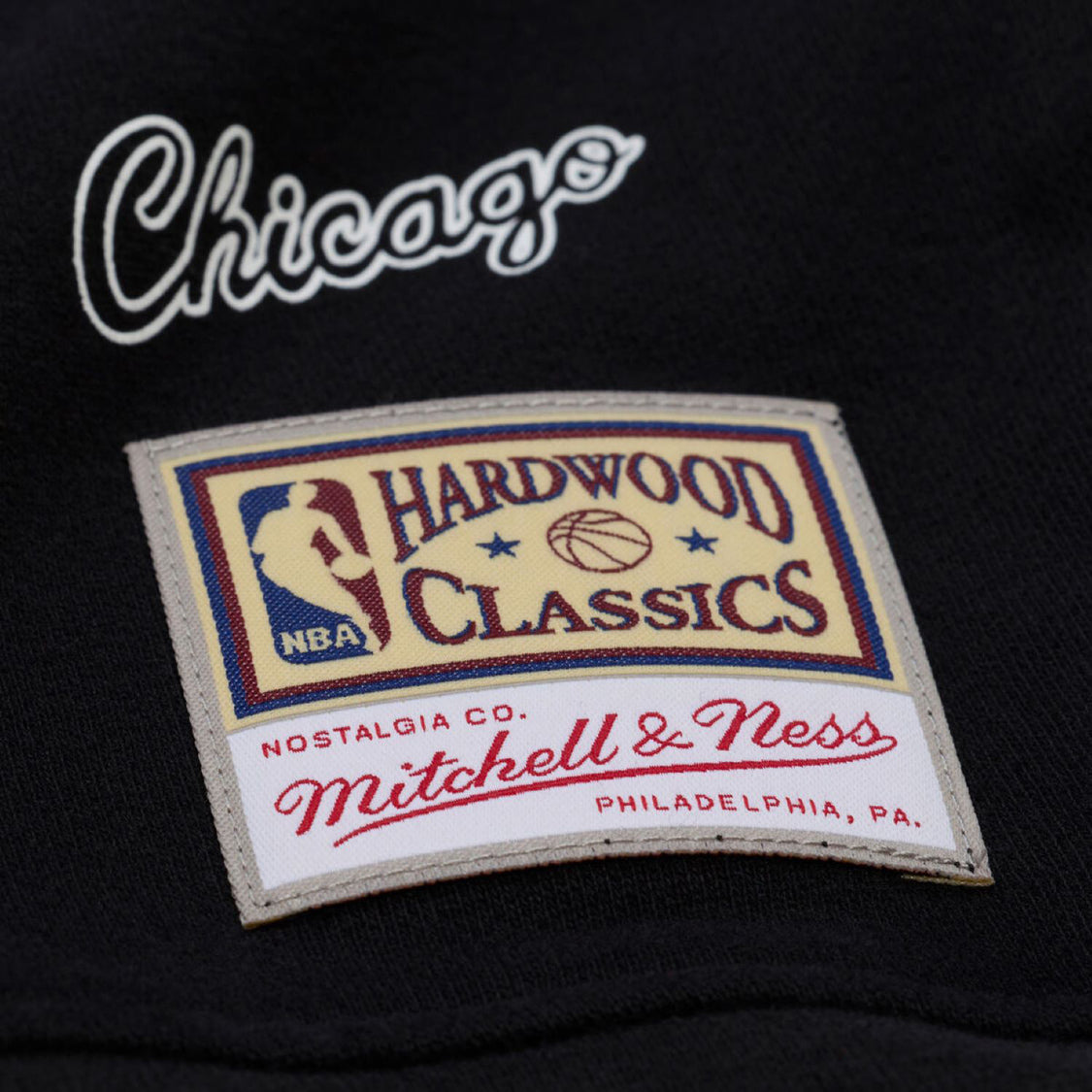 Ladies Chicago Bulls Mitchell & Ness Script Lightweight Crewneck in Black - Jock Tag View