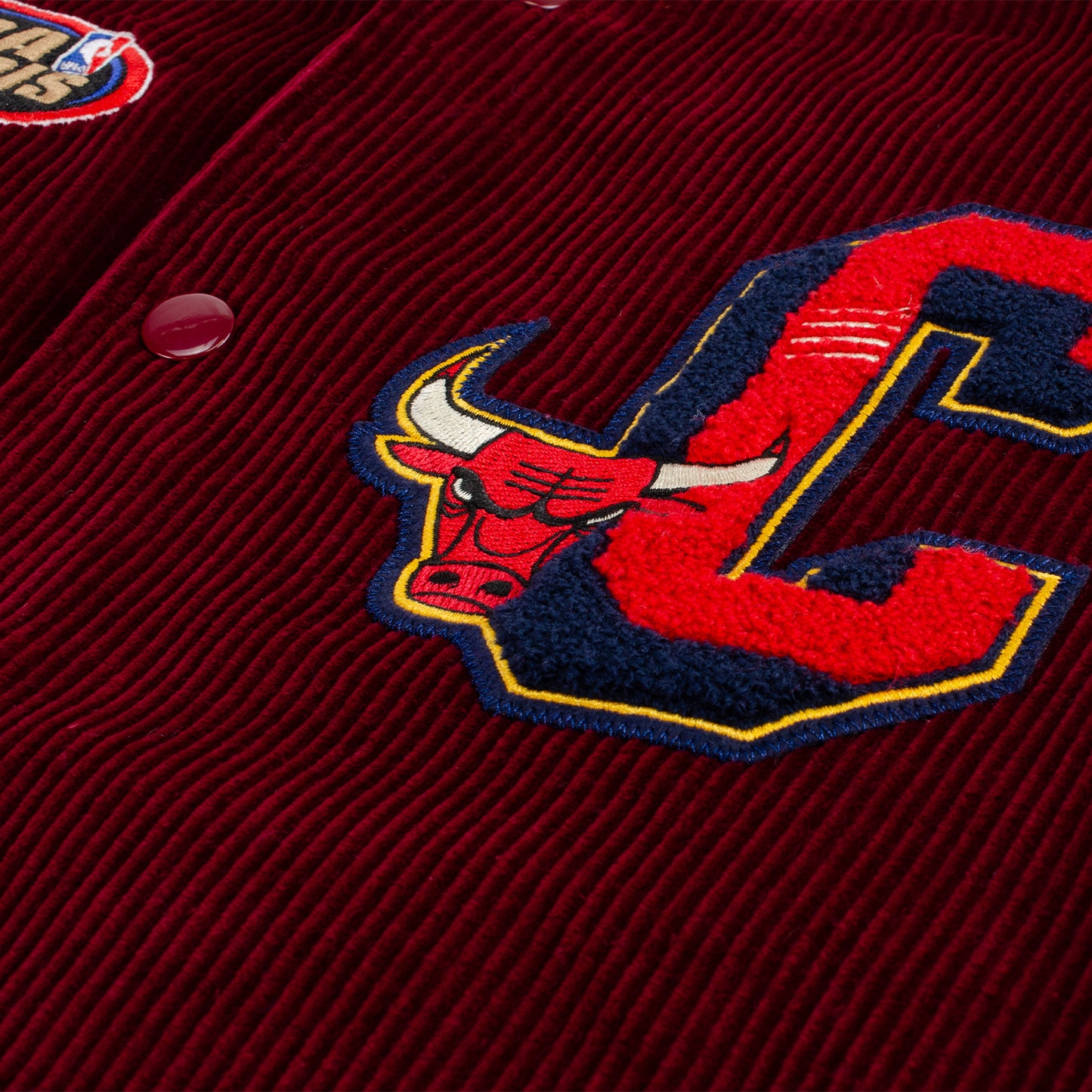 Chicago Bulls Mitchell & Ness Collegiate Varsity Jacket - close up view