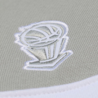 Chicago Bulls Mitchell & Ness Thunderstorm Head Coach Quarter Zip in Blue and Cream - Embroidered Detail View