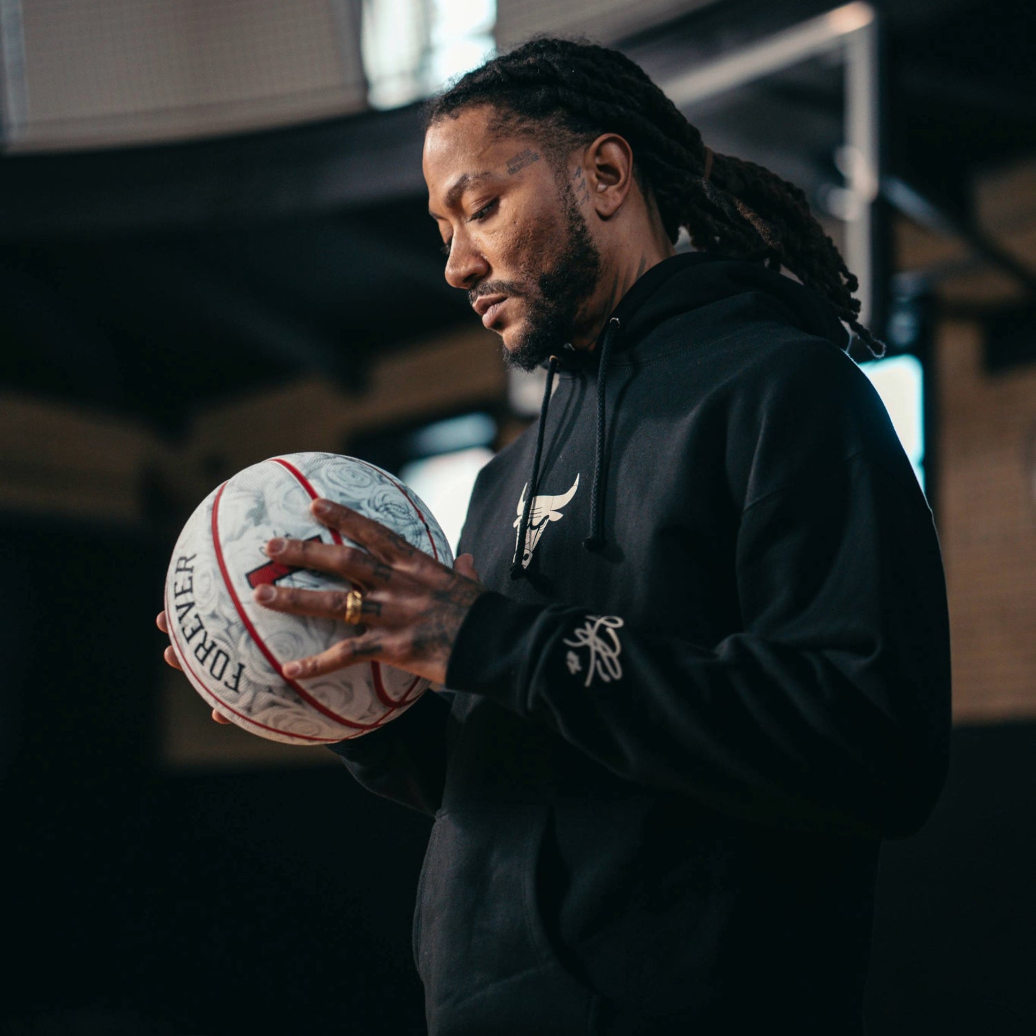 Model Holding Chicago Bulls Wilson Derrick Rose Commemorative Basketball